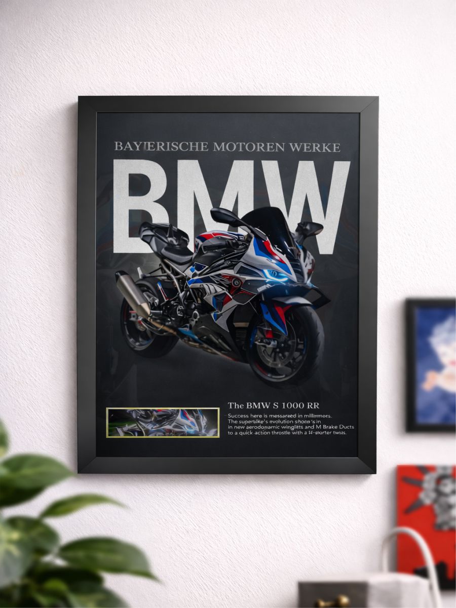 Framed poster of a BMW motorcycle on a wall with other decor items.