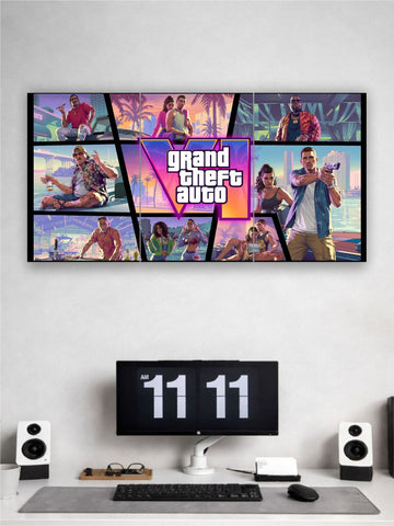 Wall-mounted TV displaying 'Grand Theft Auto' game art with a computer setup below.