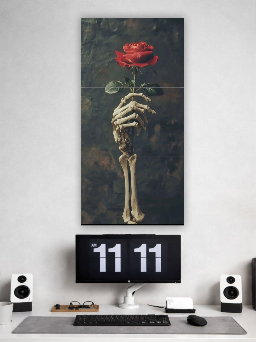 Artistic depiction of a skeleton hand holding a red rose above a computer setup with a digital clock.