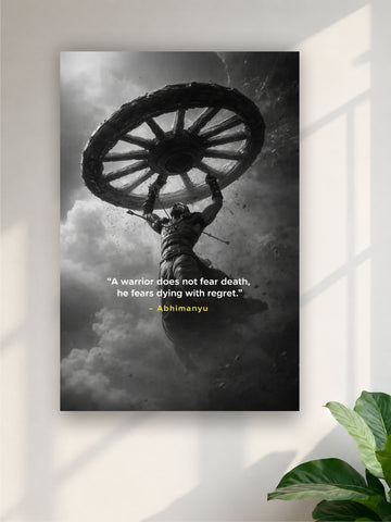 Poster of a warrior holding up a wheel with a motivational quote on a wall.