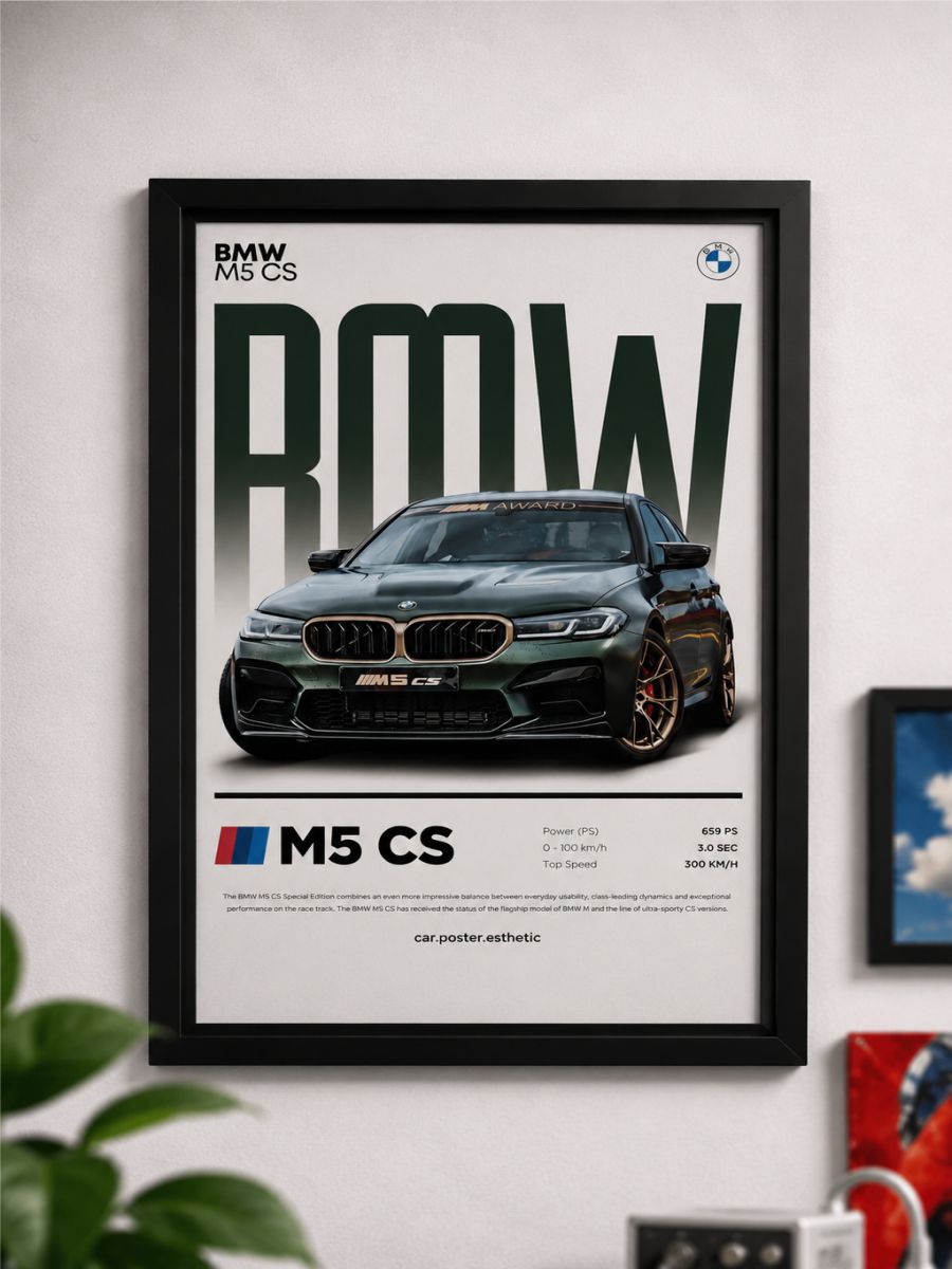 Framed poster of a BMW M5 CS on a wall with other decor items.