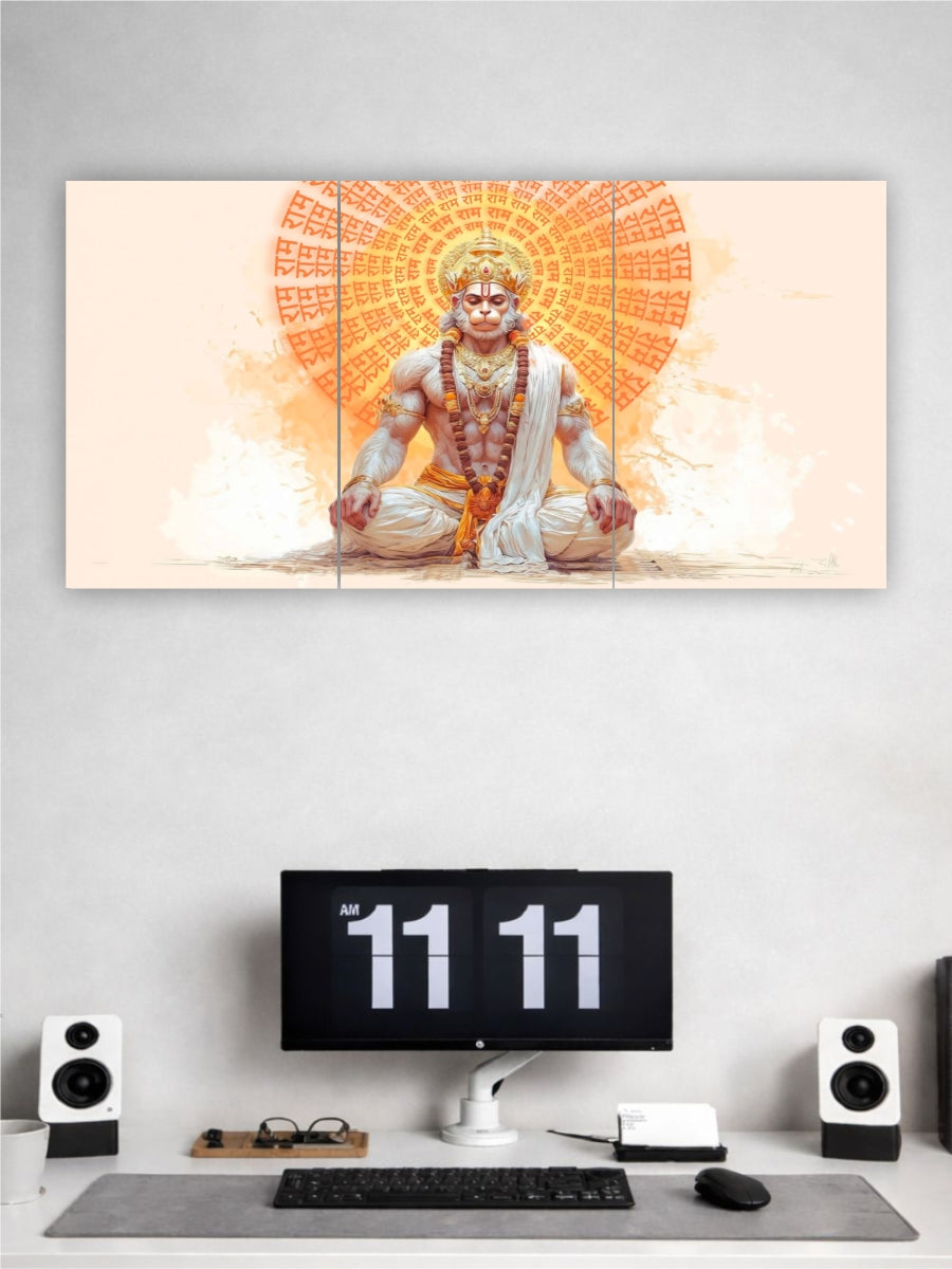 Wall art of a deity on a gray wall above a desk with a computer setup.