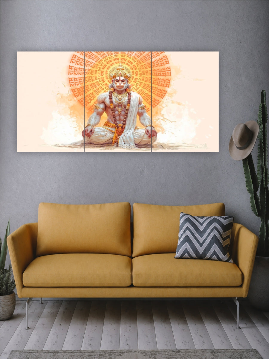 Wall art of a deity on a gray wall above a desk with a computer setup.